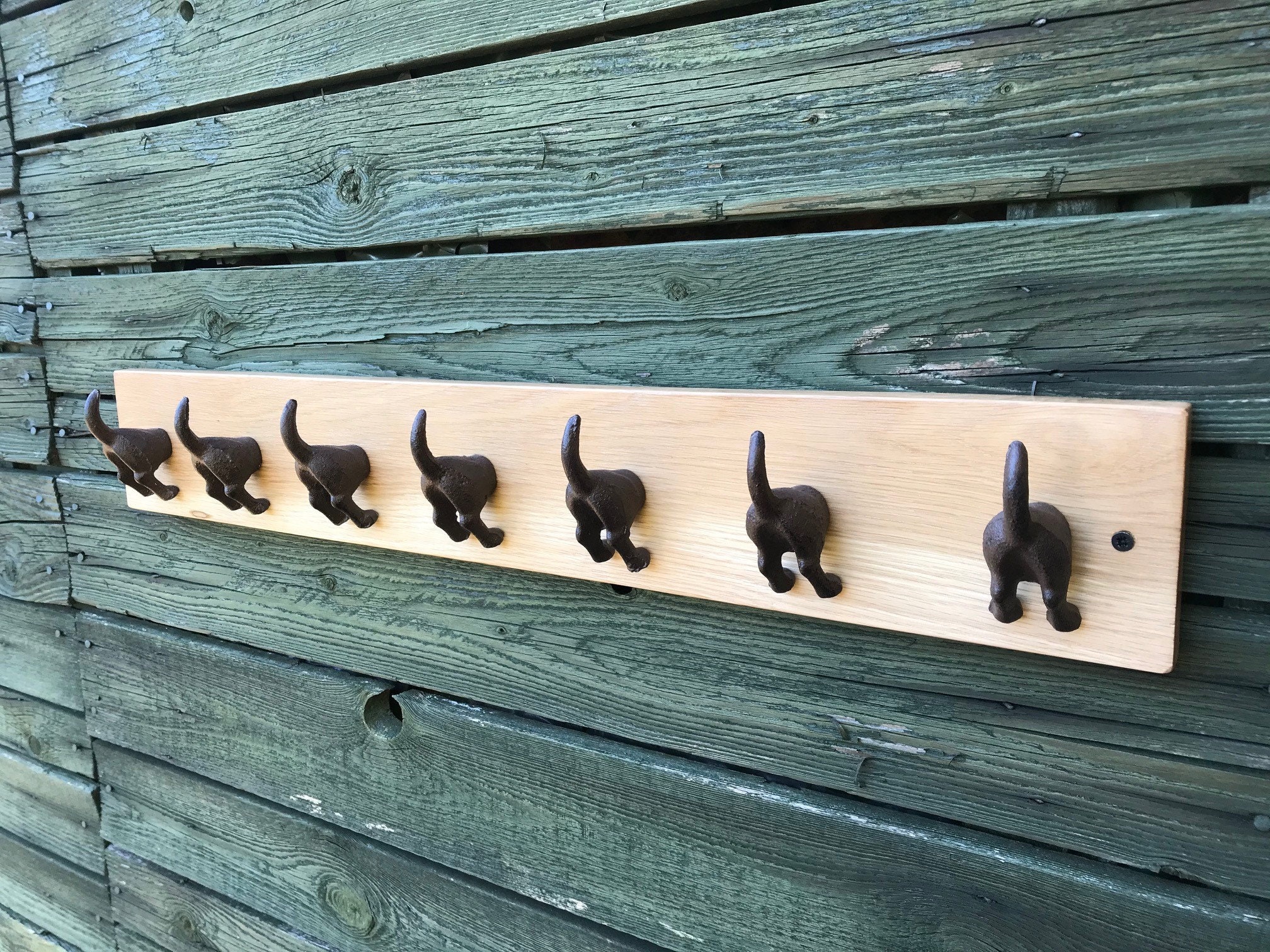 Cast Iron Dog Tail Hooks on a Waxed Oak Plinth Etsy UK