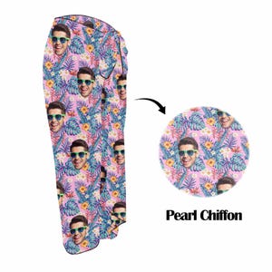 Puede incluir: Pantalones rosas con estampado tropical que presenta un patr&oacute;n repetido de la cara de un hombre con gafas de sol. La tela se describe como "Pearl Chiffon".