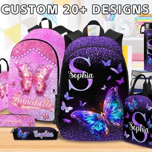 May include: A selection of personalised backpacks, lunch bags, pencil cases, and a water bottle. The items feature butterfly designs in pink and purple glitter, with custom names. The text "CUSTOM 20+ DESIGNS" is at the top.