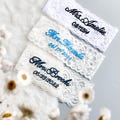 Personalized Name Wedding Garter, Wedding Toss Garter for Bride, White Lace Leg Loops, Custom MRS Garters, Wedding Gifts, Bridal Lace Garter product logo