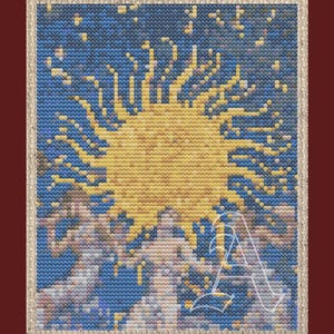 May include: A cross-stitch embroidery pattern featuring a large, radiant yellow sun centered against a deep blue background. Three stylized figures are positioned below the sun, and a large, white, outlined letter A is visible in the lower right corner.