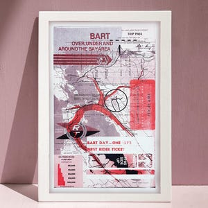 May include: A framed print featuring a vintage BART transit map of the San Francisco Bay Area. The design incorporates red and black graphic overlays, including text reading BART OVER, UNDER AND AROUND THE BAY AREA and BART DAY-ONE 1972 FIRST RIDER TICKET.