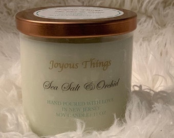 Sea Salt and Orchid Scented Soy Candle in Glass Jar with Rose Gold Lid
