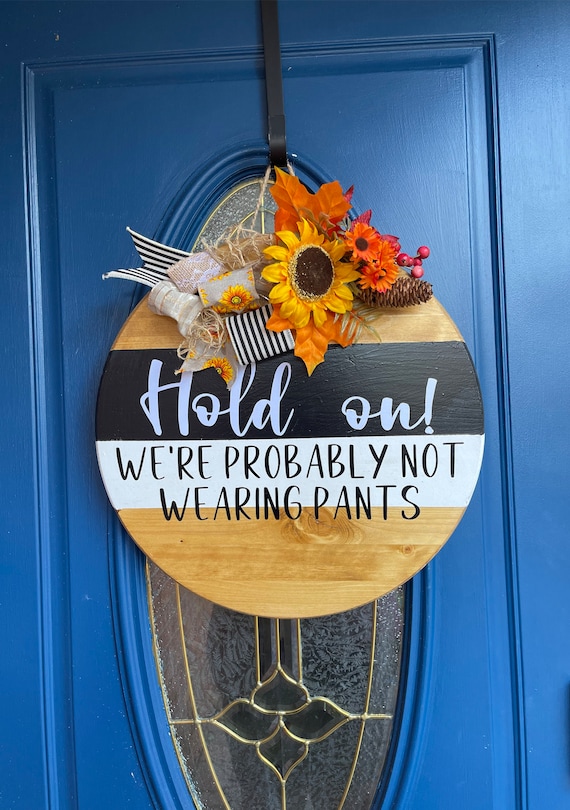 custom wood sign door hanger front porch sign new home gift hold on we're probably not wearing pants Funny door sign