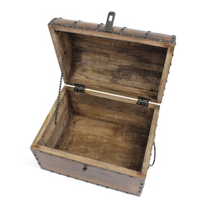 Wooden Treasure Chest With Decorative Rivets and Reinforcing Iron ...
