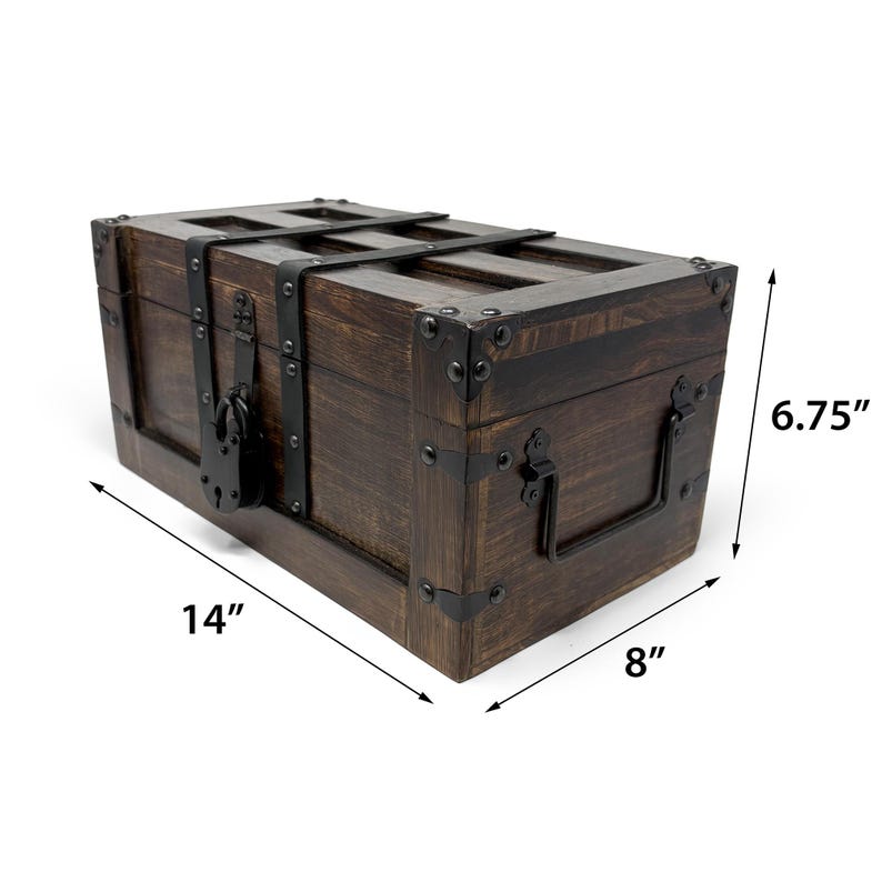 May include: A dark brown wooden chest with metal accents. The chest is 14 inches long, 8 inches wide, and 6.75 inches high. It features a metal latch and handle, and metal corner reinforcements. The chest has a vintage, antique appearance.