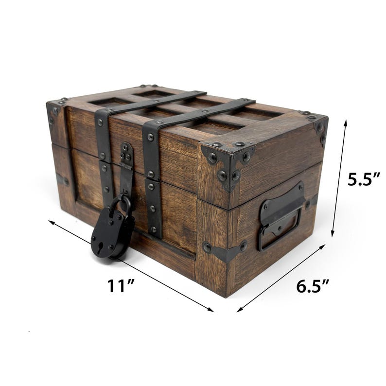 May include: A wooden treasure chest with metal accents and a black padlock. The chest is 11 inches long, 6.5 inches wide, and 5.5 inches high. It features metal straps and corner reinforcements, and a handle on the side.