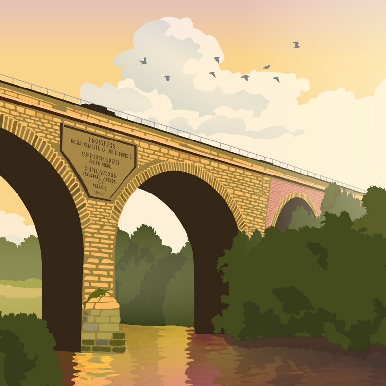 May include: A stone bridge with a plaque that reads "Contractors Thomas McShane, 1881". The bridge has two arches and is over a river with green trees on either side. The sky is a light orange and pink.