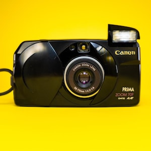 CANON PRIMA ZOOM 70F fotocamera Canon 35 mm, fotocamera a pellicola punta e scatta, fotocamera vintage 35 mm