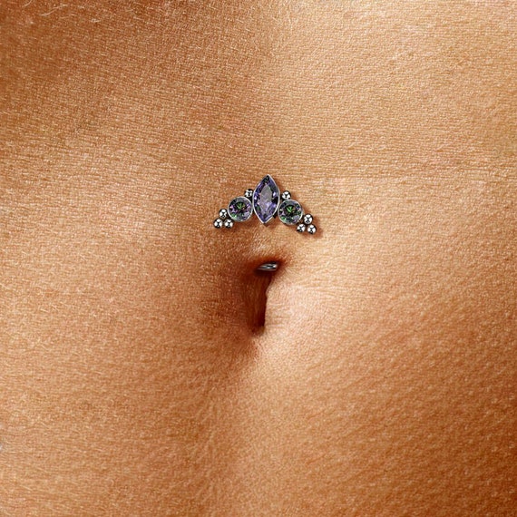 Top belly shop button piercing