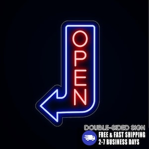 May include: A double-sided neon sign with a blue border and arrow, and the word "OPEN" in red. The sign is against a black background.