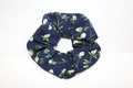 scrunchy, floral printed product logo
