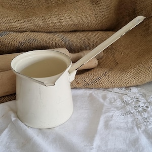 Vintage cream enamelware coffee pot