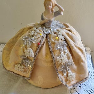 Vintage bisque porcelain lady pin cushion