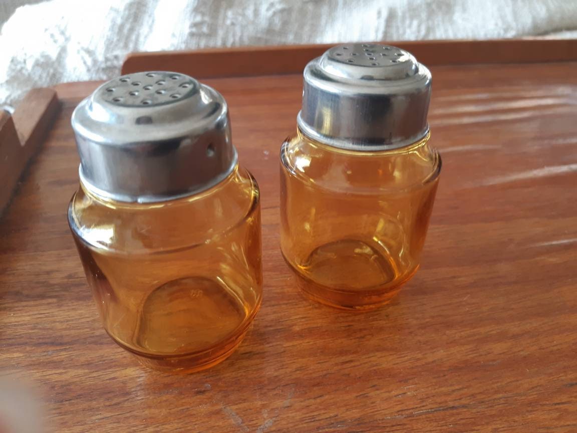 Vintage amber glass salt and pepper shakers. Etsy