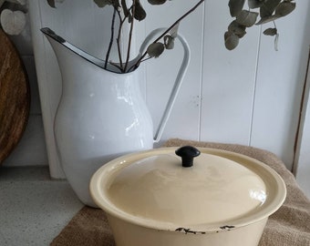 Cream enamelware pot with lid