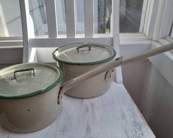 Set of two vintage green enamelware pots