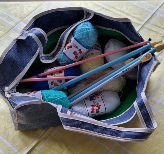 Vintage knitting bag with knitting needles and wool