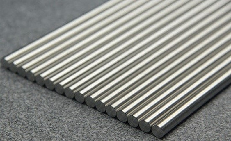 Metallic Rods In Parallel Zr702 Round Rod, 6mm, 8mm, 10mm, 12mm,16mm and 18mm Diameter. Black ...