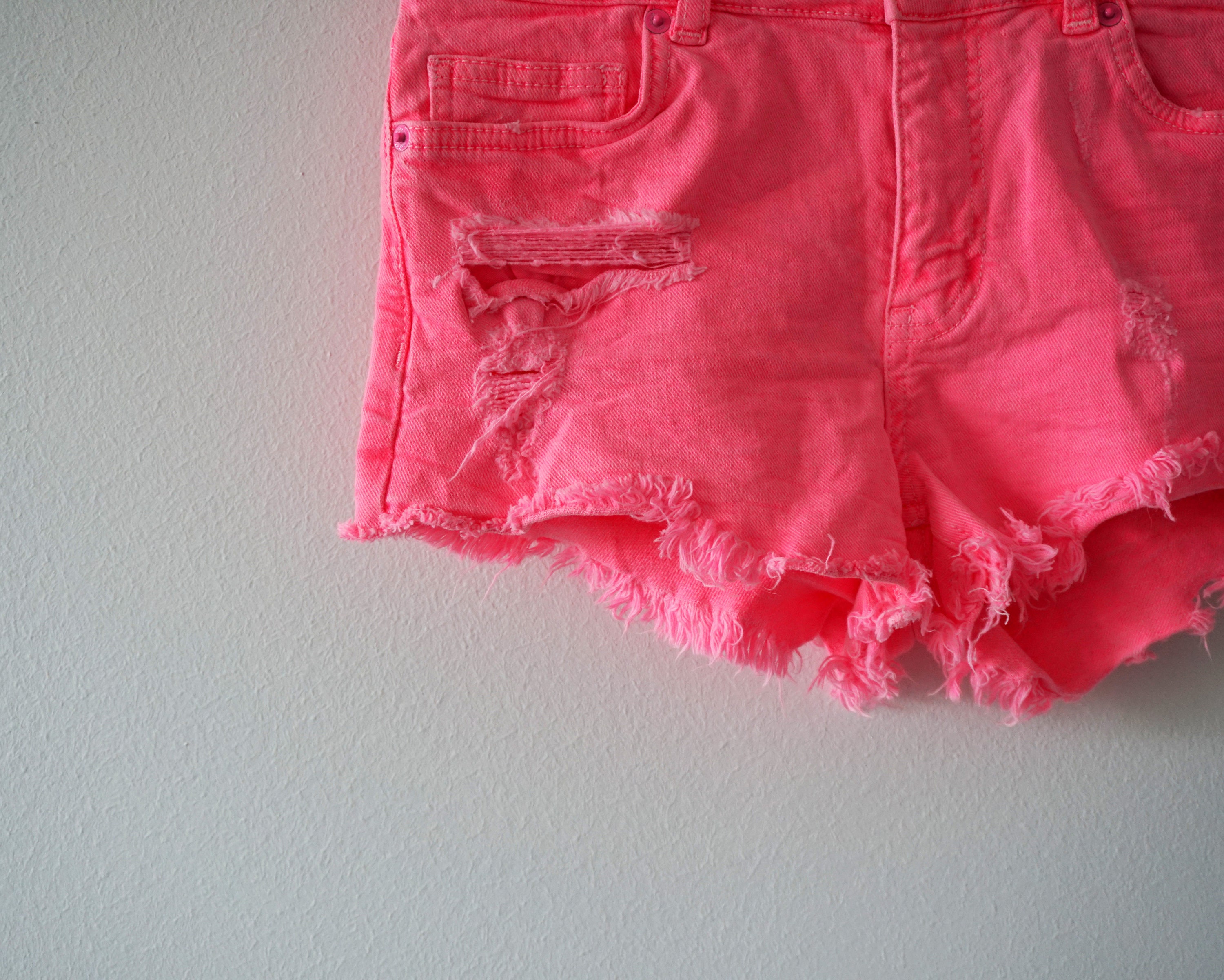 Neon pink denim shorts shop