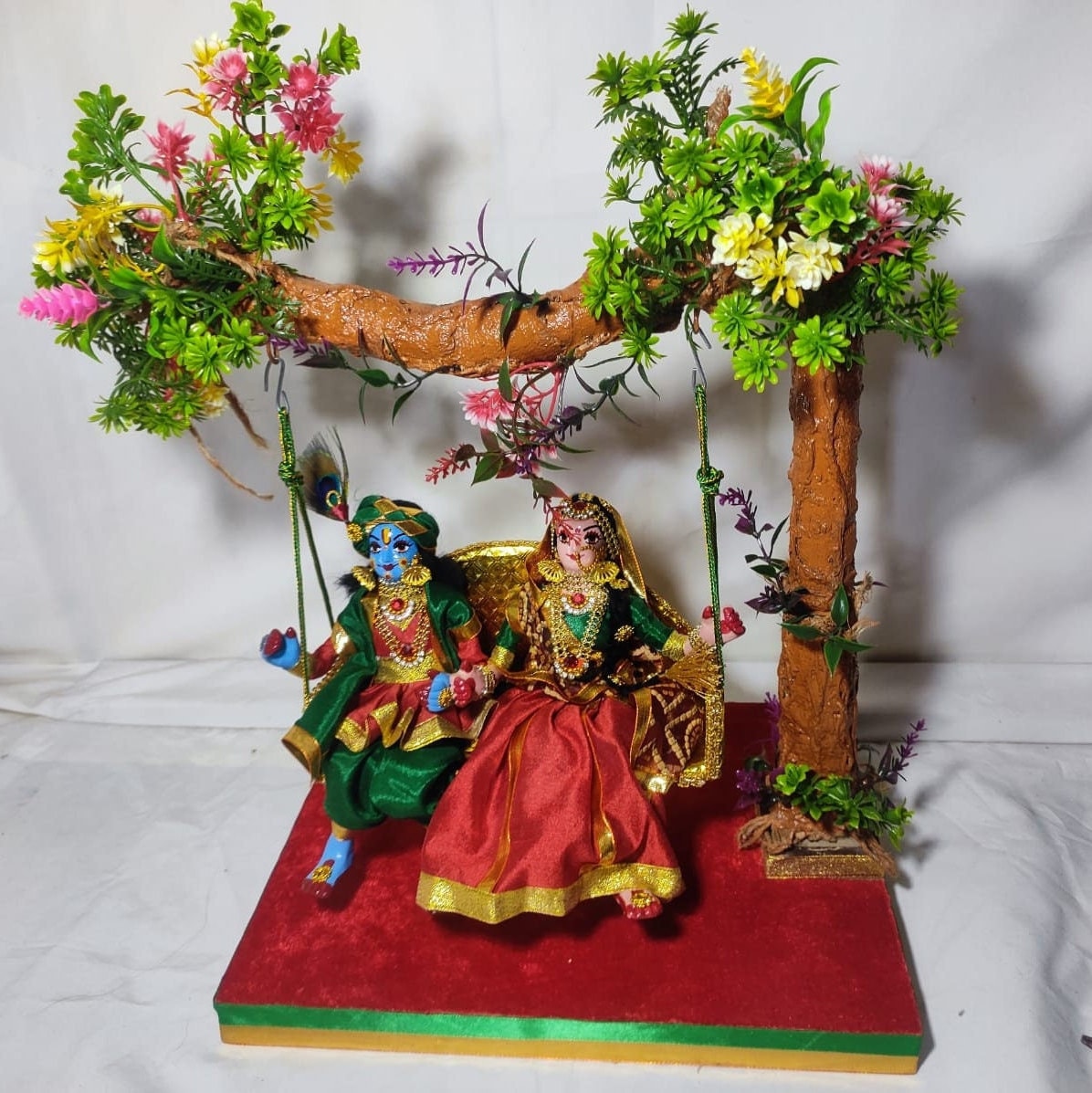 Radha Krishna on a Swing/Jhula - Krishna Leela/Jhanki - Janmashtami - Handmade devotional handicrafts from Arya Creations