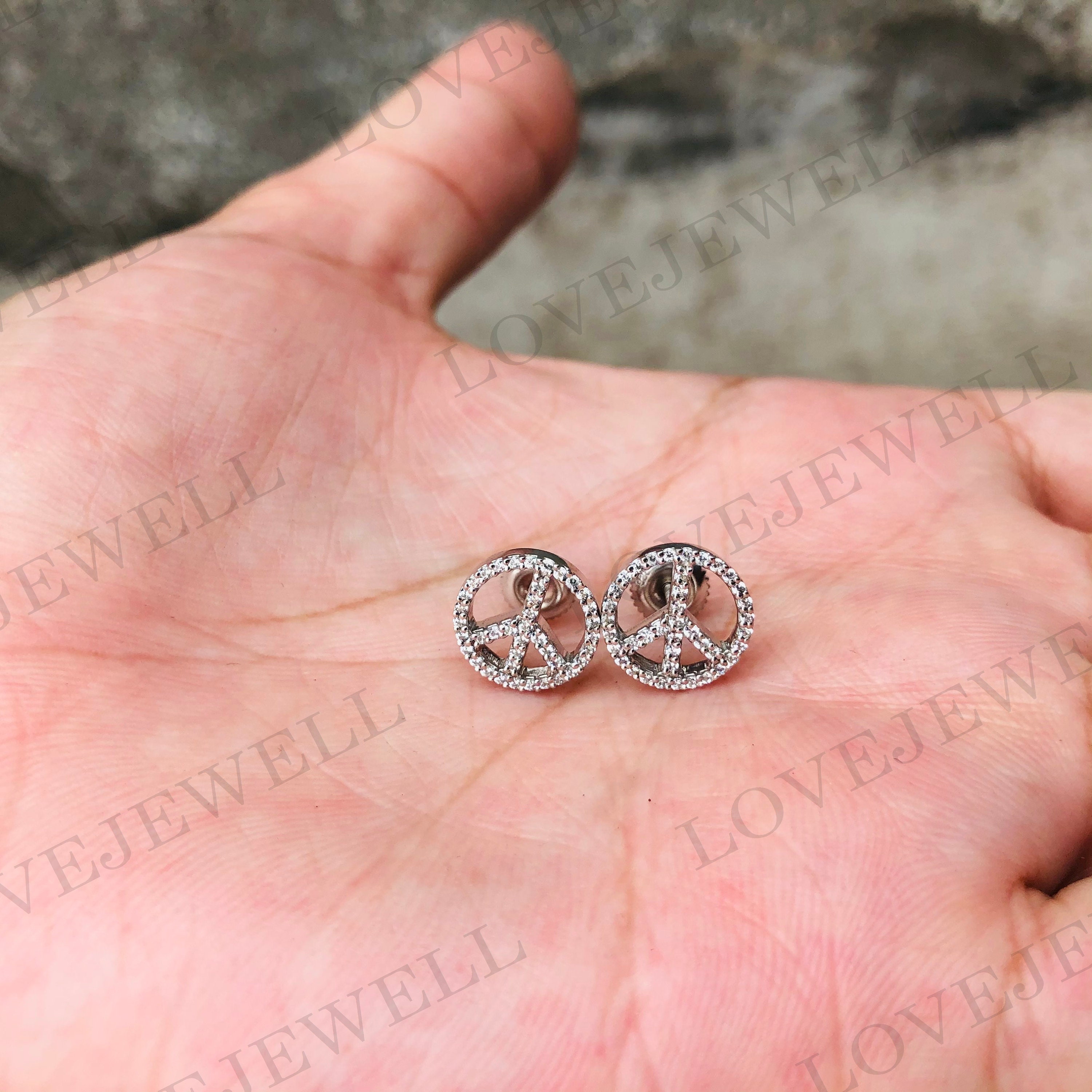 Diamond peace best sale earrings