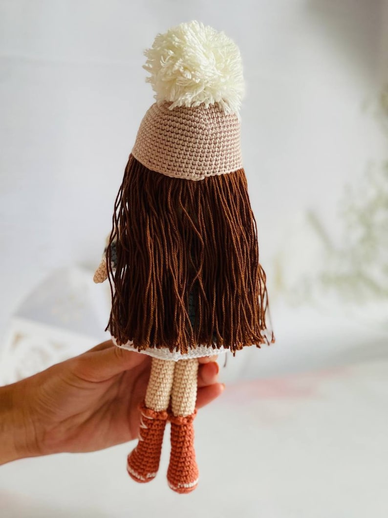 Handmade Crochet Festive Doll with winter clothes and snowflakes,Crochet Winter Doll with snowflake pattern, Handmade Crochet Snowflake Girl in festive winter clothes,Crochet Festive Doll with snowflake detail, with cute snowflake outfit