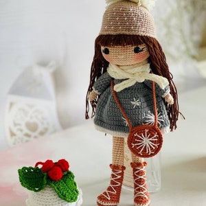 Handmade Crochet Festive Doll with winter clothes and snowflakes,Crochet Winter Doll with snowflake pattern, Handmade Crochet Snowflake Girl in festive winter clothes,Crochet Festive Doll with snowflake detail, with cute snowflake outfit"