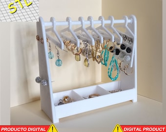 May include: White plastic earring holder with multiple hooks for hanging earrings and a bottom shelf with three compartments for storing jewelry. The holder is designed for 3D printing.