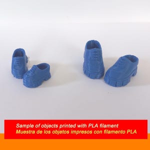 May include: Four small, blue 3D-printed shoes are arranged on a white surface. The shoes are a solid blue color and have a textured appearance. The text at the bottom reads: "Sample of objects printed with PLA filament".