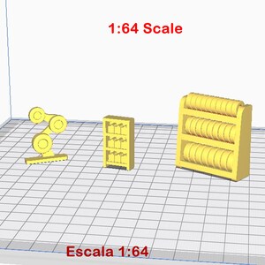 May include: Three yellow 3D printed models in 1:64 scale. The first model is a robotic arm with two rotating joints. The second model is a shelf with five rows of small rectangular objects. The third model is a shelf with three rows of round objects.