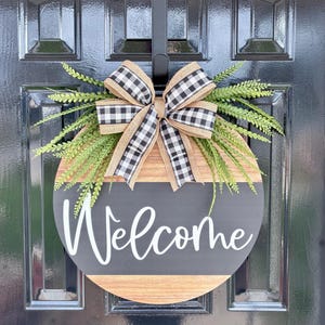Farmhouse Welcome Door Hanger: Buffalo Plaid Bow, Faux Greenery