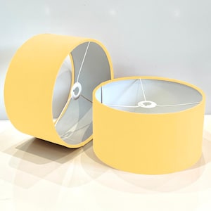 New handmade yellow gold  velvet drum lamp shade suitable for tables and ceilings with white  lining all shapes available sizes on demand