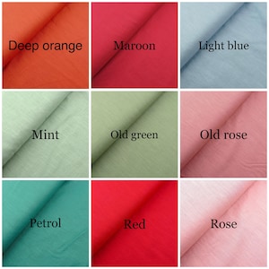 May include: Nine fabric swatches in different colors, including deep orange, maroon, light blue, mint, old green, old rose, petrol, red, and rose.