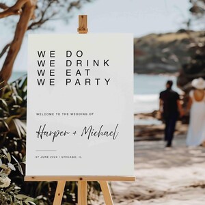 May include: White wedding sign with black text that reads "We Do, We Drink, We Eat, We Party". Below the text is "Welcome to the Wedding of Harper + Michael" and the date "07 June 2024 / Chicago, IL".