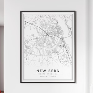 May include: Black and white line art map of New Bern, North Carolina. The map shows the city's streets, waterways, and landmarks. The text "NEW BERN - NORTH CAROLINA - 35.1085°N - 77.0441°W" is printed below the map.