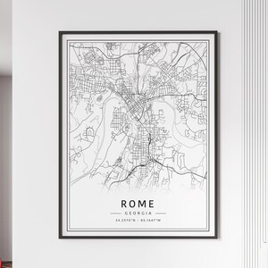 May include: Black and white line art map of Rome, Georgia. The map shows the city streets and includes the text "ROME GEORGIA 34.2570°N - 85.1647°W".