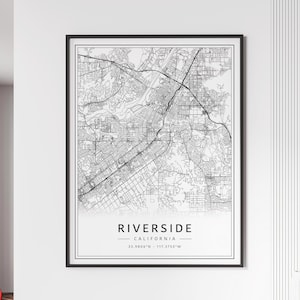 May include: Black and white map print of Riverside, California. The map shows the city streets and landmarks. The text "Riverside, California" and the coordinates "33.9806°N - 117.3755°W" are printed below the map.