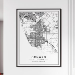 May include: Black and white map print of Oxnard, California. The map shows the city streets and includes the coordinates 34.1975°N - 119.1771°W.