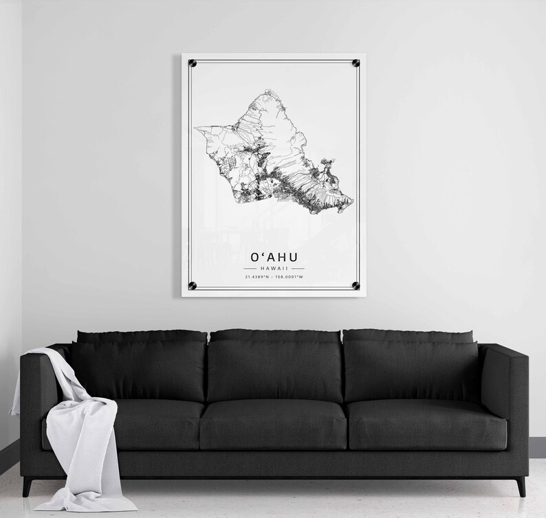 May include: A black and white line art print of the island of Oahu, Hawaii. The print includes the name "O'AHU" and the coordinates "21.4389&deg; N - 158.0001&deg; W".