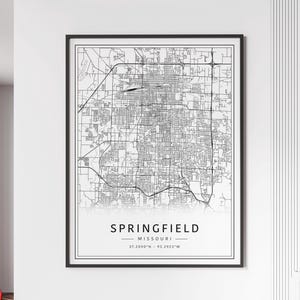May include: Black and white map print of Springfield, Missouri. The map shows the city streets and includes the coordinates 37.2090°N - 93.2923°W.