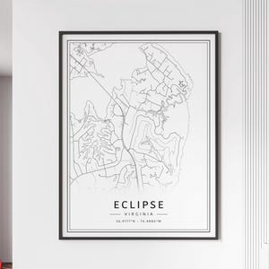 May include: Black and white line art map print of Eclipse, Virginia. The print features the name of the town and the coordinates 36.9171°N - 76.4886°W.