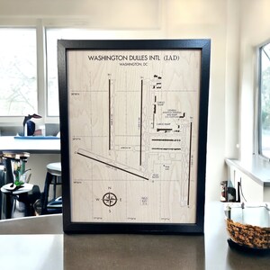 Gift your pilot the perfect aviation plaque.  This is the 12x16 sized framed airport diagram which shows all the intricacies of Dulles Airport.