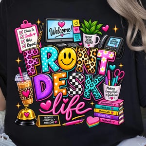 May include: A black t-shirt featuring a colorful graphic with the text "FRONT DESK life". The design includes a computer monitor, a clipboard, a desk bell, a mug labeled "FRONT DESK SQUAD", a telephone, a pen, and a stack of books with office tasks.