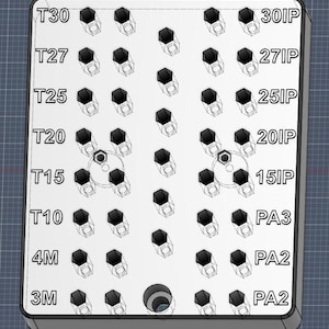 May include: A silver-colored metal tool organizer with multiple holes and black hex-shaped tools. The organizer has labels such as "T30", "T27", "T25", "T20", "T15", "T10", "4M", "3M", "30IP", "27IP", "25IP", "20IP", "15IP", "PA3", and "PA2".