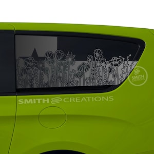 May include: Lime green vehicle with a floral decal on the rear window. The decal features a variety of stylized flowers in white. The text "SMITH CREATIONS" is visible on the vehicle.