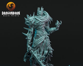 May include: A detailed resin print of a skeletal figure, crowned and armored, holding a sword. The figure has spiky protrusions and tattered cloth. The base has the text "Witchsong" and the logo "Dragonborn Resin Prints".
