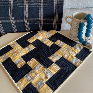 20” Rainbow twist Square gold, beige and white with black background table topper