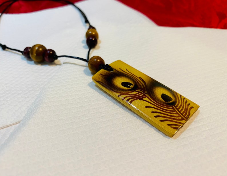 Peacock feather design bamboo necklace