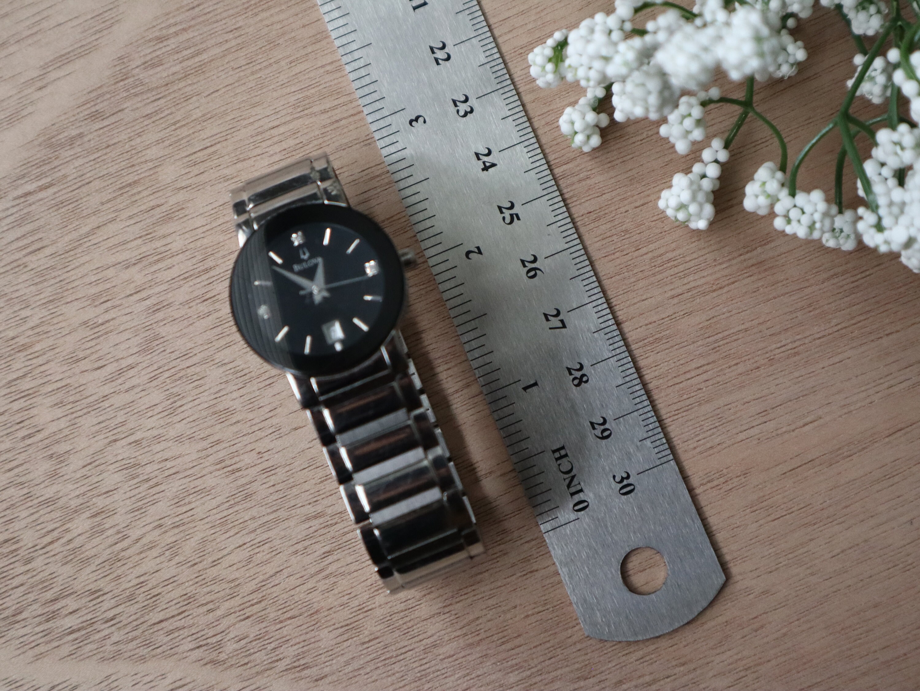 Bulova Stainless Steel Date Black Diamond Dial Women